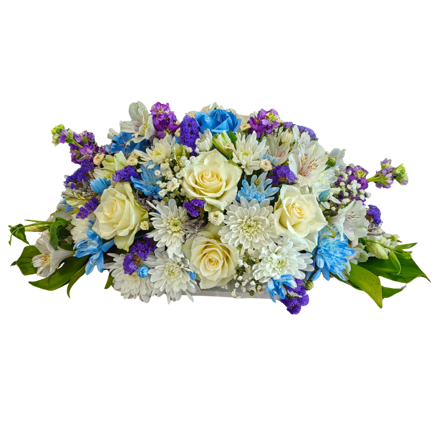 Front view of Divine Blooms centerpiece showcasing white florals and purple statice with delicate blue accents and fresh foliage in artistic harmony.