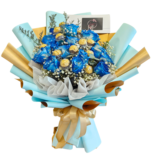 Bouquet of soft light blue roses with Ferrero Rocher chocolates, lilac limonium, and white gypsophila, wrapped in elegant blue and gold floral paper.