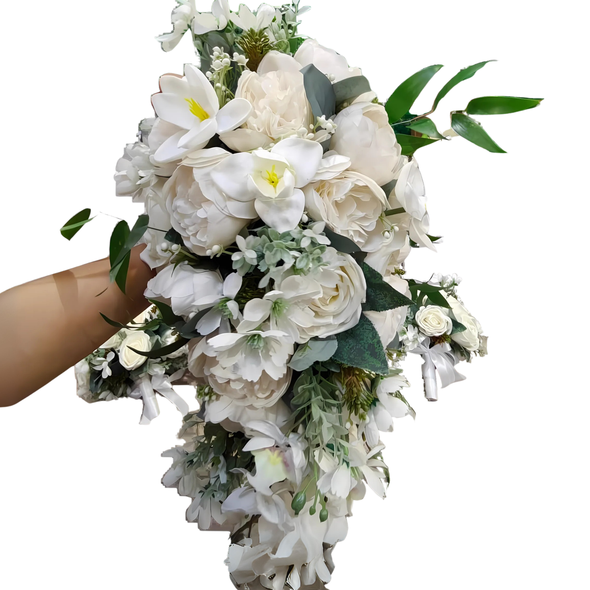 Handheld cascading white bridal bouquet featuring white peonies, roses, lorchids, and lush greenery with a teardrop shape, designed by Hayat Flowers and Events.