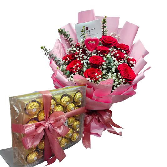 Romantic red rose bouquet with white gypsophila and eucalyptus, wrapped in soft pink floral paper with ribbon finish.